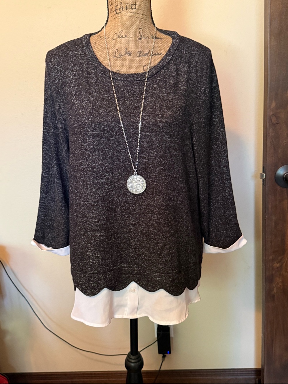 Faith & Joy Black Layered-Look Knit Top with White Hem (necklace not included.)